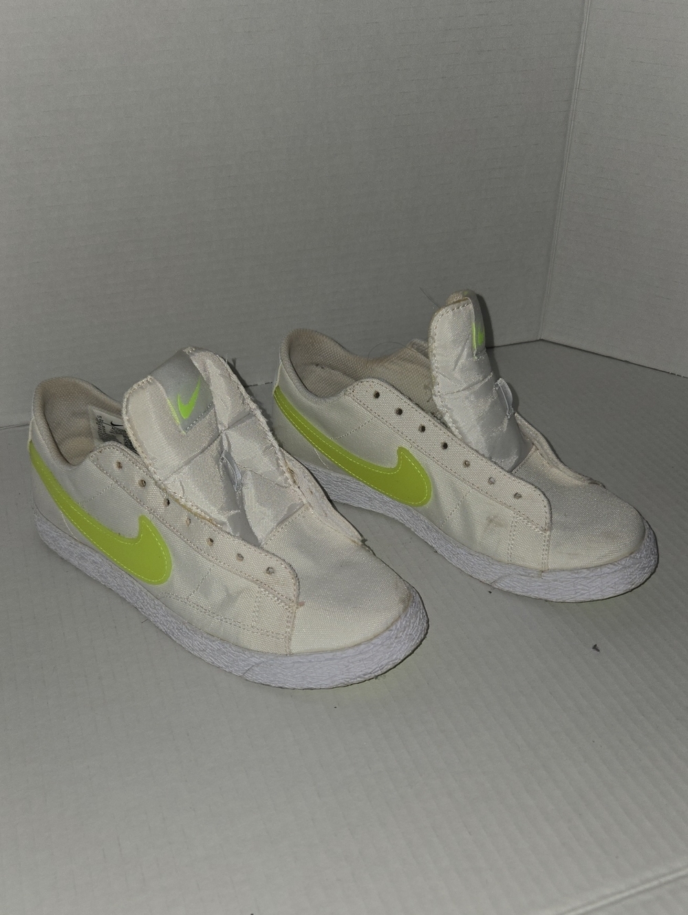 Nike White Low-Top Sneakers with Neon Green Swoosh